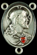 Photo of STERLING SILVER SACRED HEART OF JESUS CENTER W/RUBY 1325