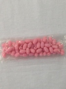 Photo of PINK 6X8MM POLISHED PLASTIC BEAD 636P